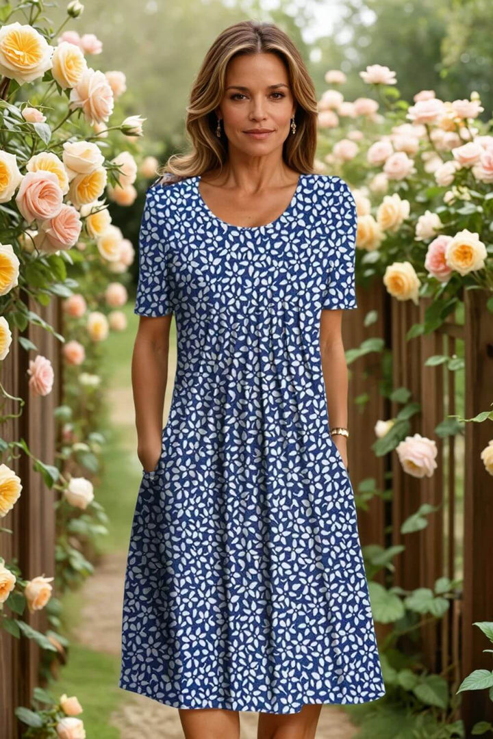 Agnes™- Elegant blomsterkjole med magevennlig passform