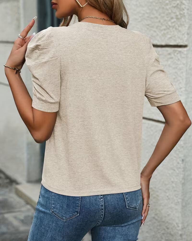 Trine™ – Stilig topp med puffermer