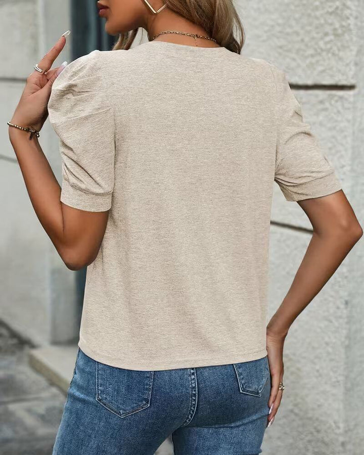 Trine™ – Stilig topp med puffermer