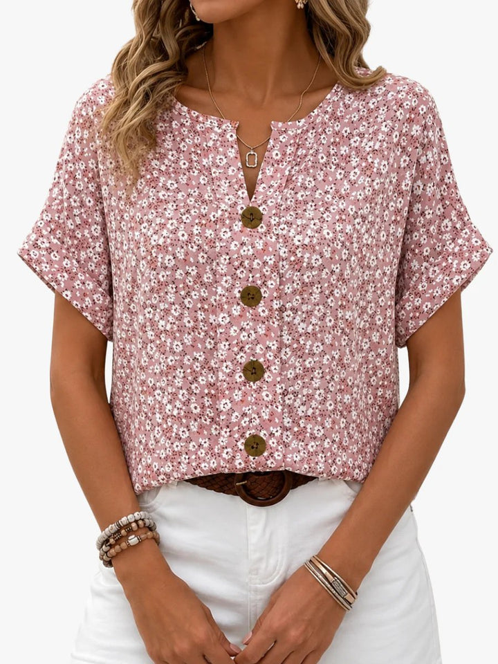 Rita™ – | Blomstrete Bluse med Knapper og Korte Ermer