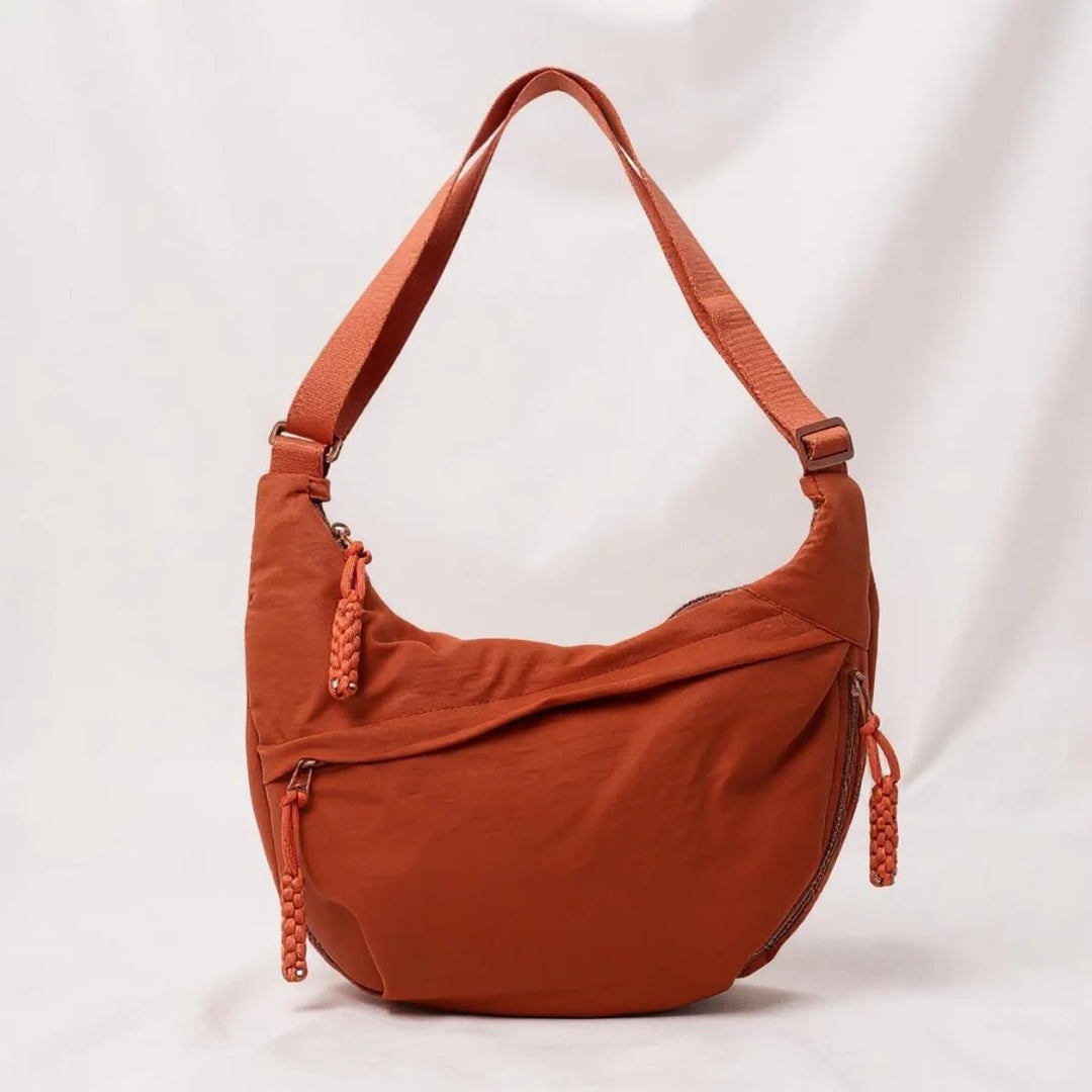 Oline™ – Anti-tyveri Halvmåne Crossbody Skulderveske