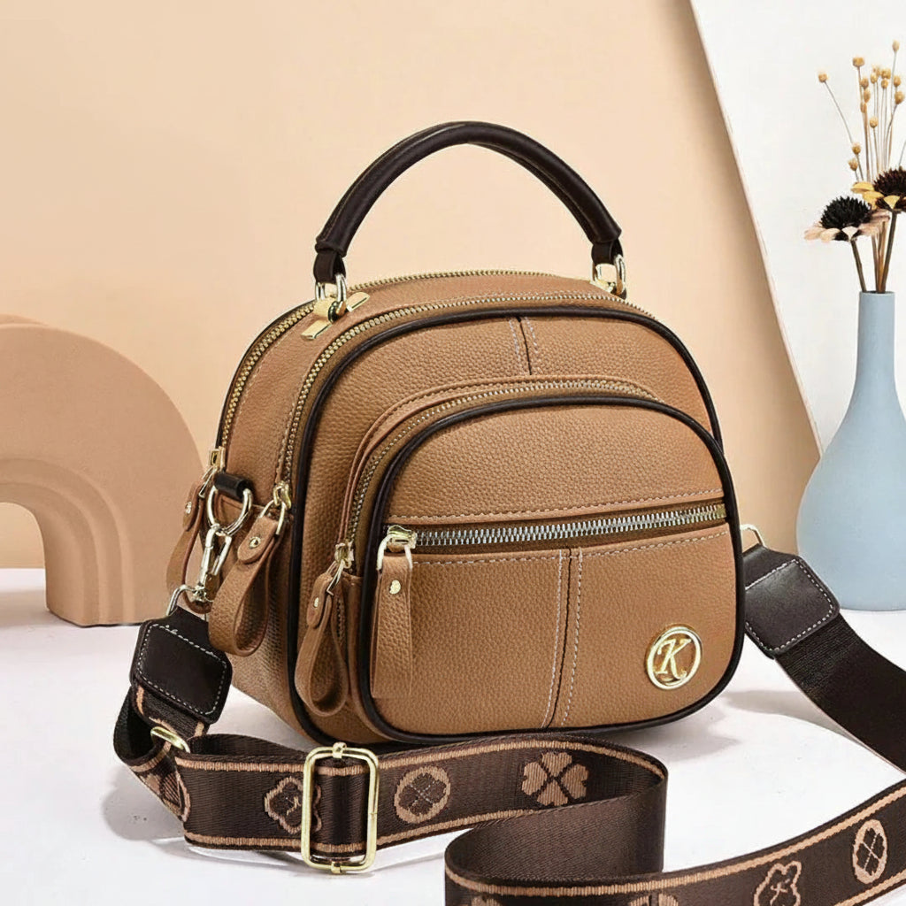 Marcella™ – Gulldetaljer Multi-Lomme Crossbody Veske