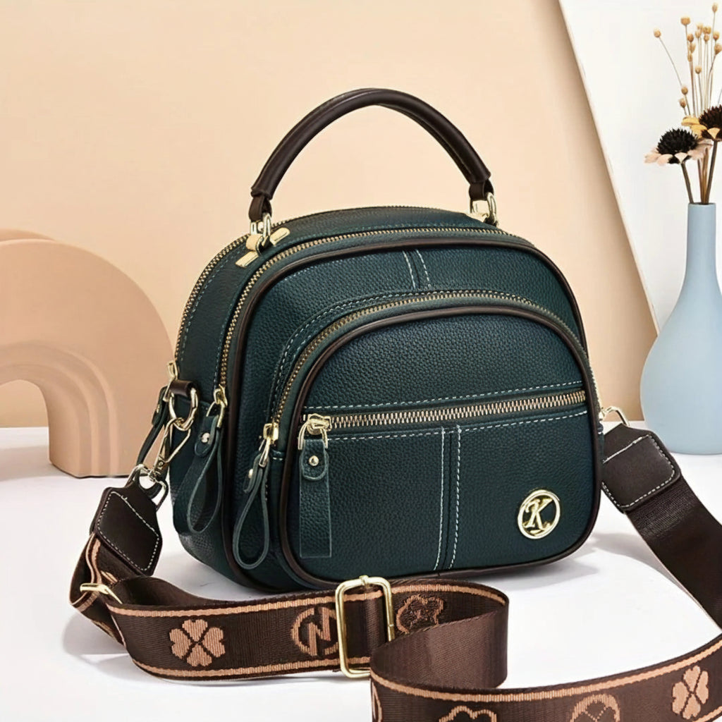 Marcella™ – Gulldetaljer Multi-Lomme Crossbody Veske