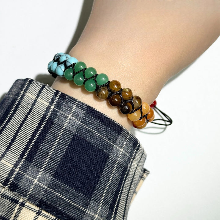 Aura™ – Armbånd med perler av 7 chakra edelstener
