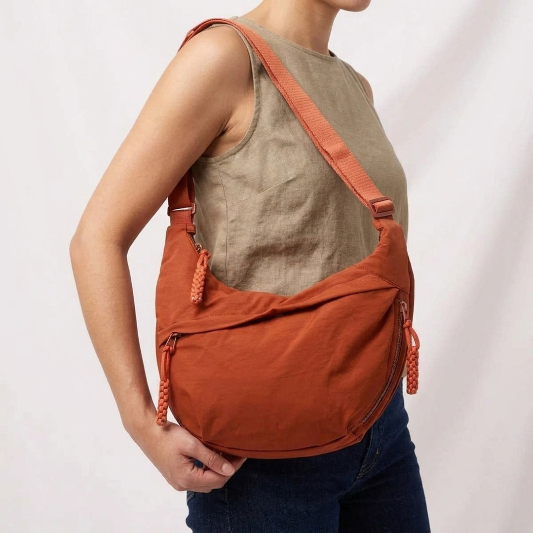 Oline™ – Anti-tyveri Halvmåne Crossbody Skulderveske